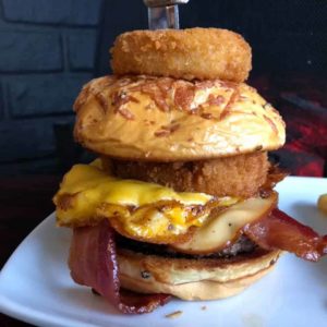 Cheeseburger with Bacon and Onion Rings from Radius Restaurant in Valparaiso Indiana